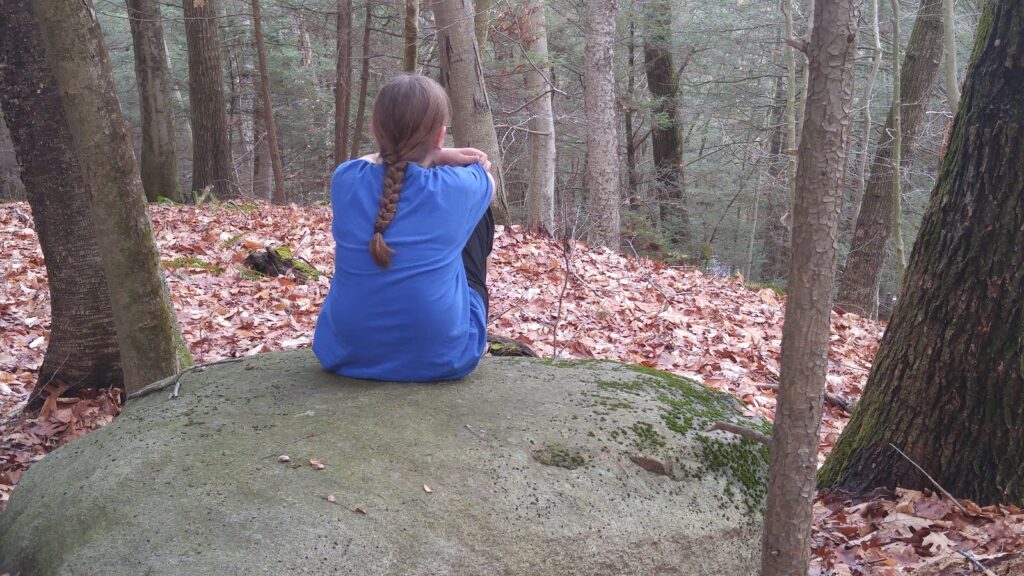 a girl in the woods