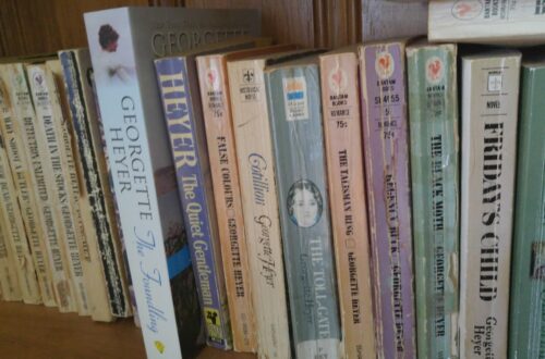 shelf of Heyer novels