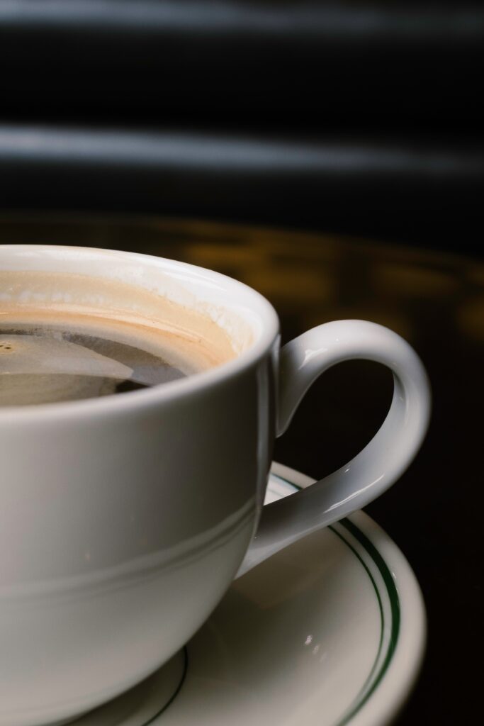 close up of a coffee cup and saucer
